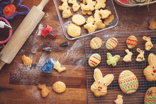 decorating easter cookies with colorful icing picture id11365833261